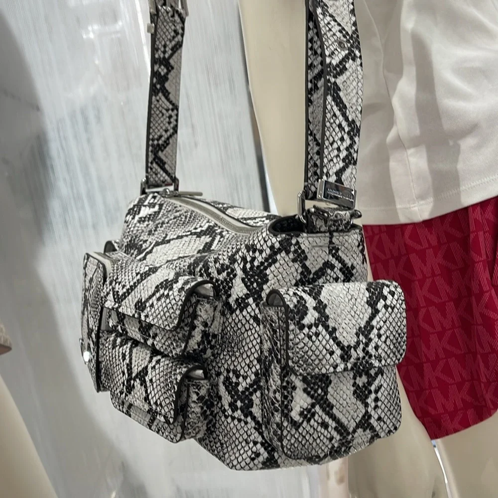 MICHAEL KORS Dakota Medium Snake Embossed Leather Pocket Shoulder Bag
ALUMINUM - Picture 15 of 16